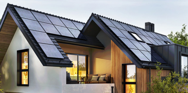 Maison a double toiture équipée de panneaux solaires hybrides