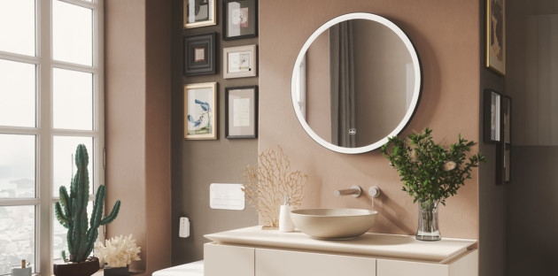 Miroir rond blanc dans une salle de bains