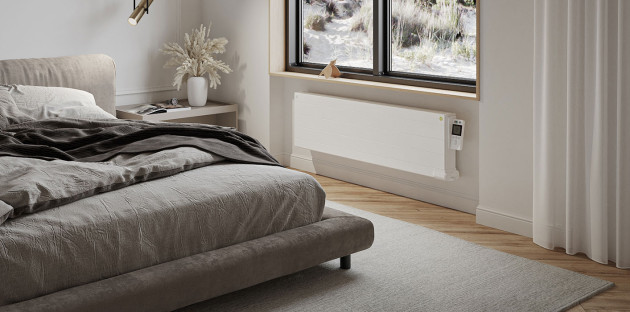 Chambre à coucher cosy avec un radiateur fixe moderne